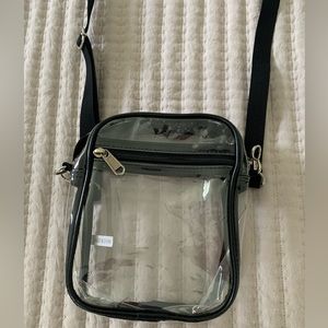 Clear plastic crossbody stadium bag. Used once for Eras Tour